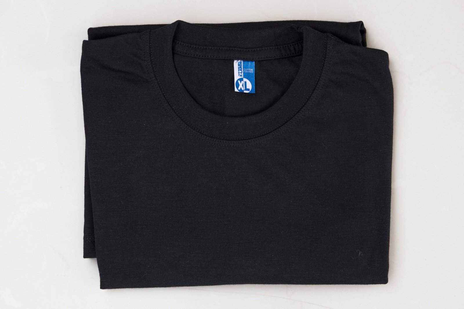 a black shirt with a logo